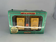 Load image into Gallery viewer, NIB Magnetic Salt and Pepper Shaker Set Attractives Kissing  School Buses CB1