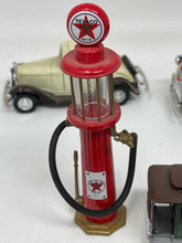 Load image into Gallery viewer, Vintage vehicles lot with gas pump B54