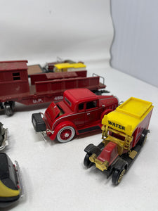 Vintage vehicles lot with gas pump B54