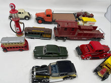 Load image into Gallery viewer, Vintage vehicles lot with gas pump B54