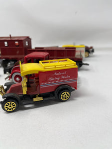 Vintage vehicles lot with gas pump B54