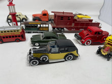 Load image into Gallery viewer, Vintage vehicles lot with gas pump B54