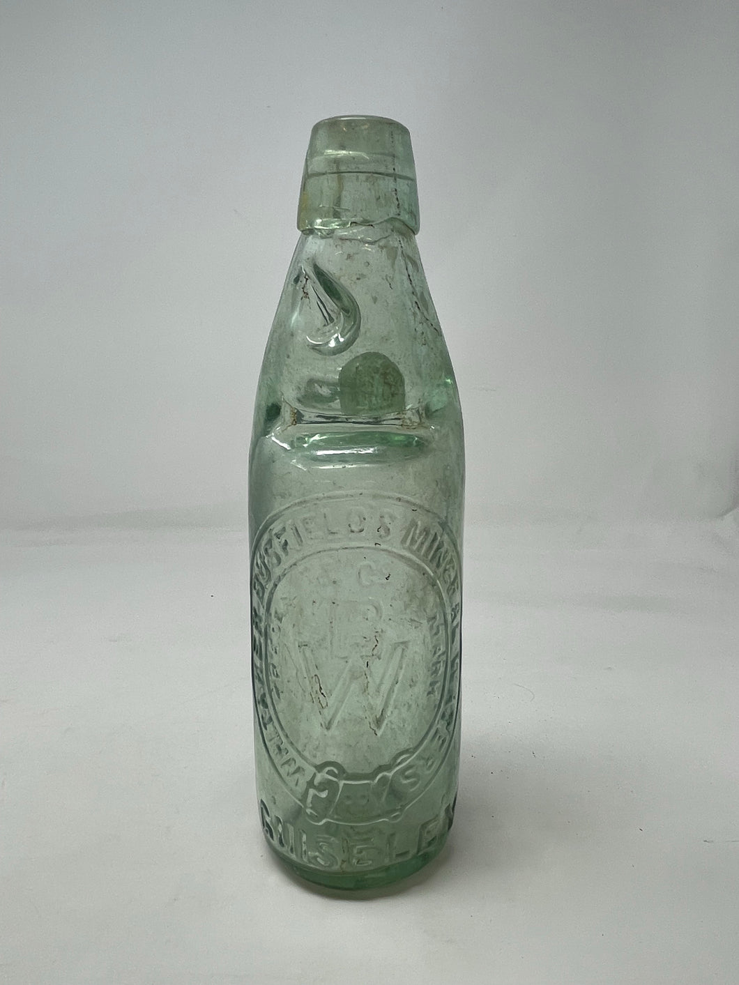 VINTAGE - 1 PINT WHITAKER BUSFIELD & CO GUISELEY MINERAL WATER/BEER BOTTLE.  B48